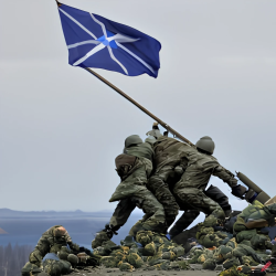 craiyon_223957_iwo_jima_flag_raise_but_with_nato_flag_in_lapland.png