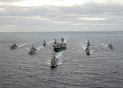 US_Navy_031130-N-3653A-002_USS_George_Washington_(CVN_73)_Carrier_Strike_Group_formation_sails...jpg